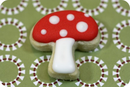 red and white decorated mushroom cookie