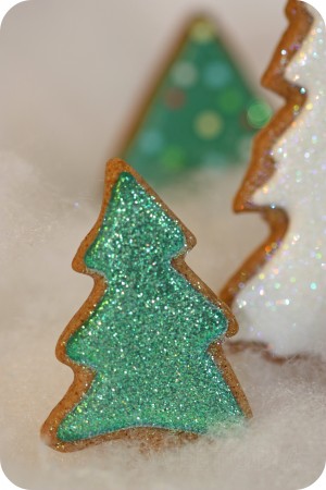green decorated tree cookie with disco dust